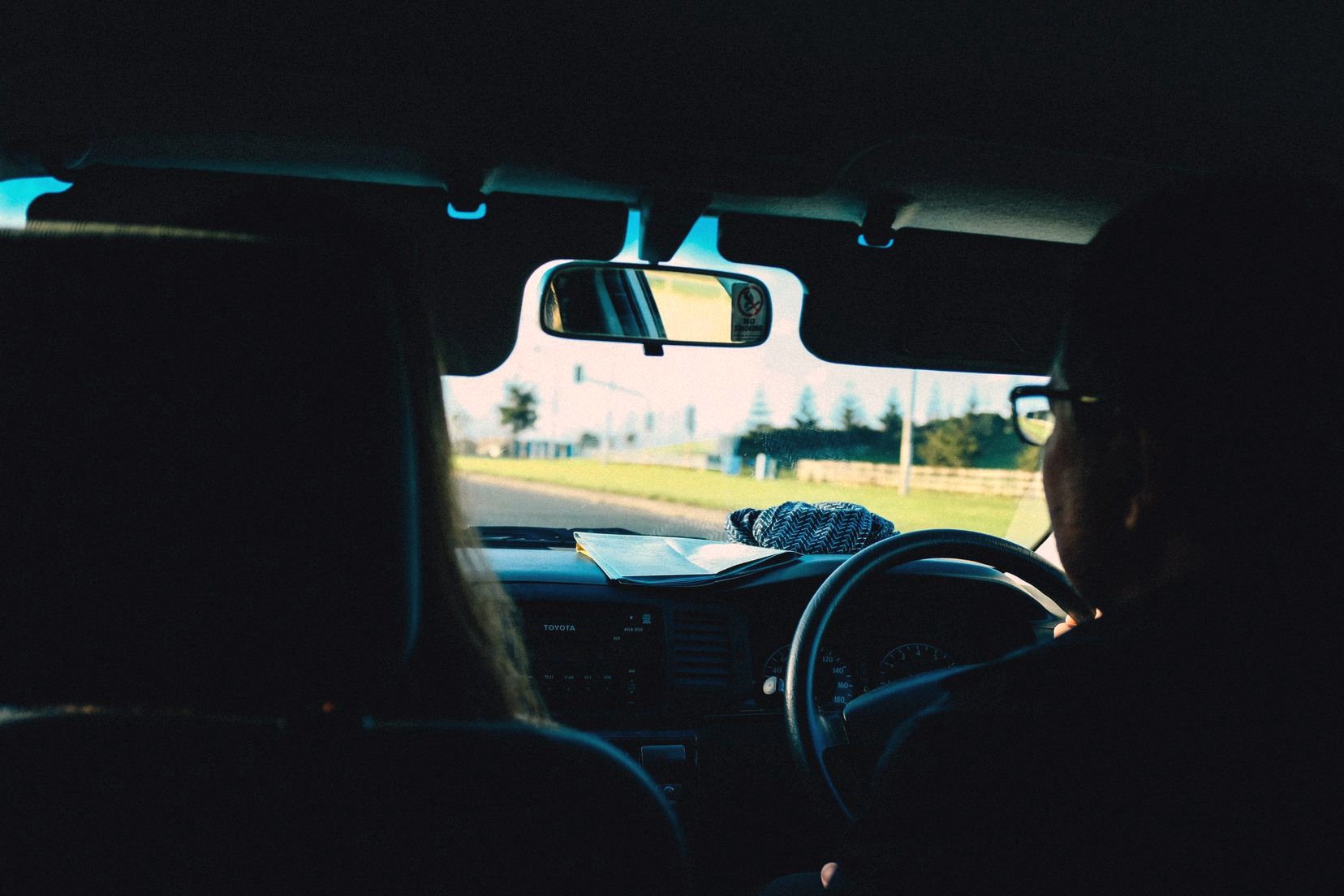 Learner and instructor in a right-hand-drive car on a UK road